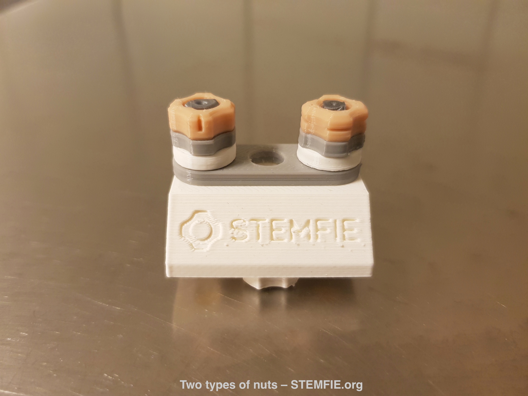 STEMFIE.org Two types of nuts with markings Cam locking and threaded v04