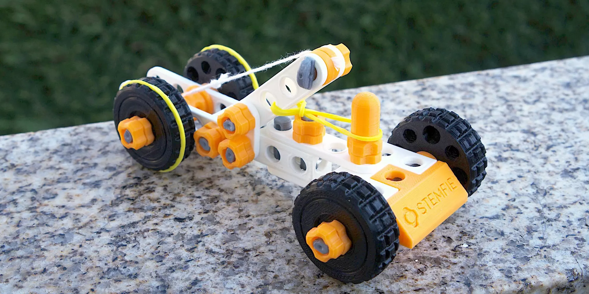 The STEMFIE Rubber-band-driven Car is a fun build and an excellent demonstration of energy retention and controlled release. Inspired by the classic mousetrap car science class experiment, this project helps children understand fundamental physics concepts while having a blast!